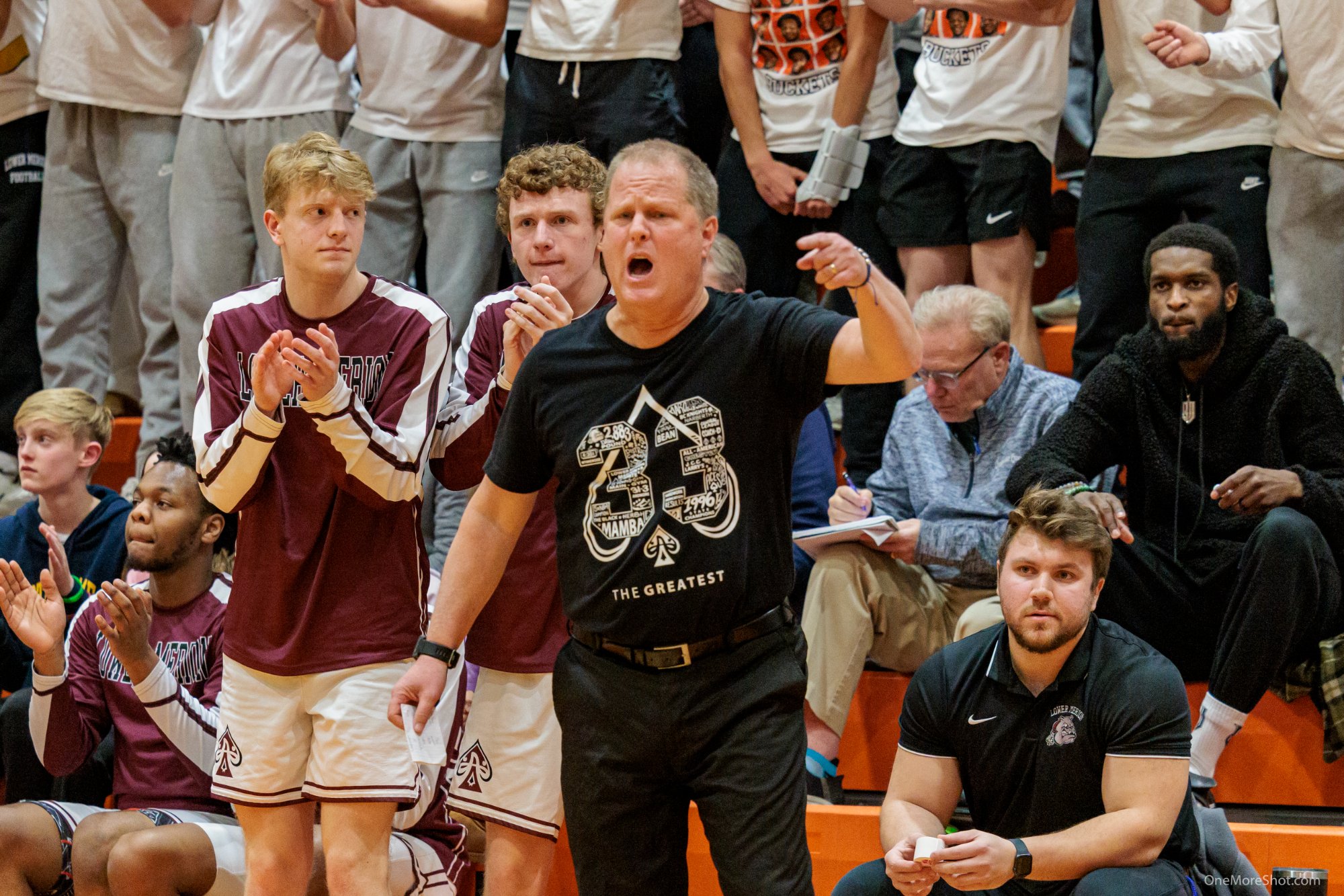 Coach Downer working with player